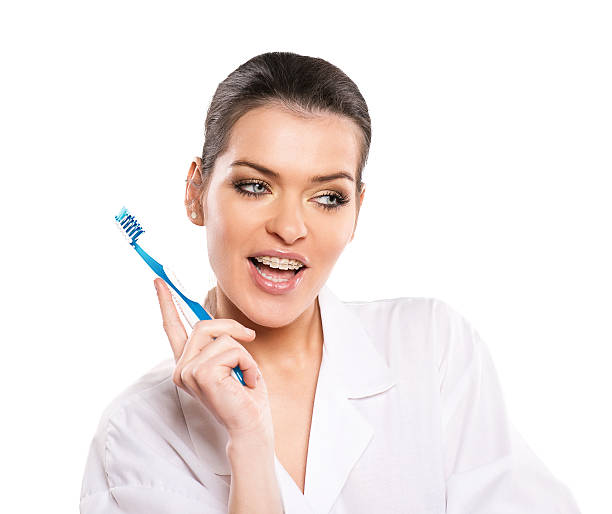 istock attractive woman with tootbrush 162426264