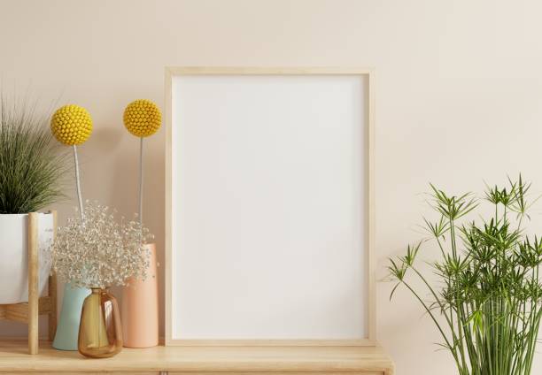 istock Poster frame mockup with vertical wooden frame in home interior background. 1624302209