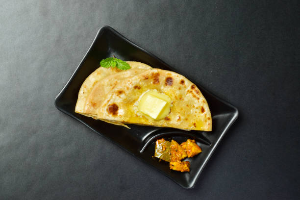 istock Top view of aloo paratha with mango aachar 1624343364