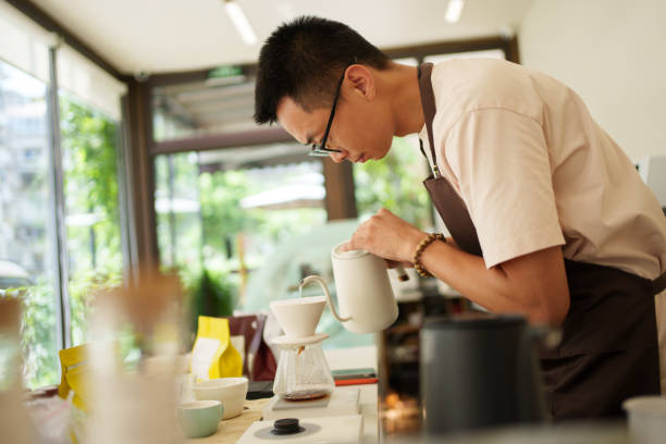istock barista in coffee shop 1624365175