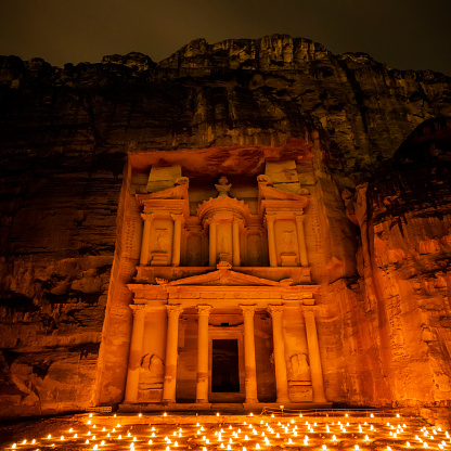 Treasury (Khasneh) in Petra, Jordan at night. Petra by Night in the light of 1,800 candles.