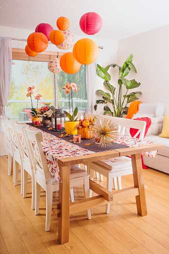Thanksgiving table setting with hanging paper lanterns