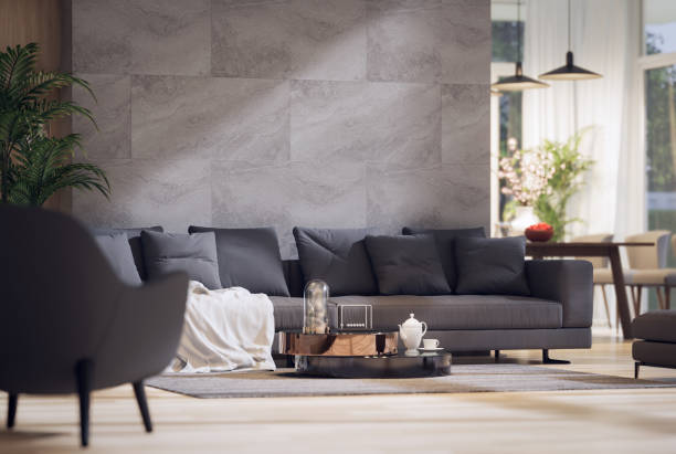 Closeup view of modern contemporary style living room with gray marble stone wall 3d render stock photo