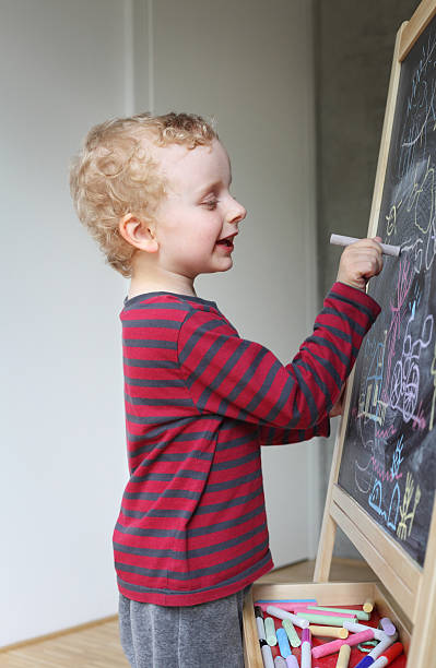 istock Little boy drawing a picture 162440186