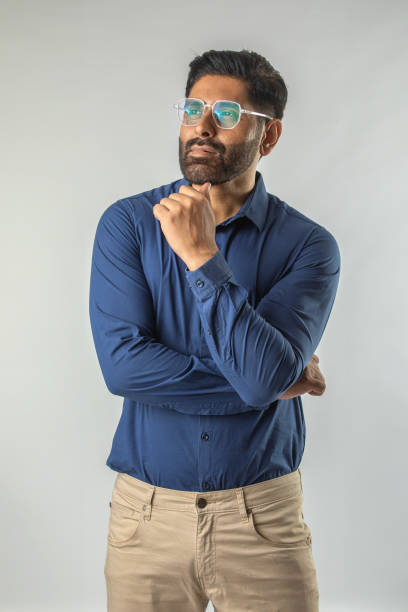 istock Thoughtful businessman looking away over white background 1624416115