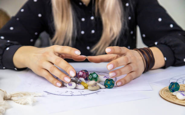istock Woman numerologist astrologer counts numbers. Selective focus. 1624438556