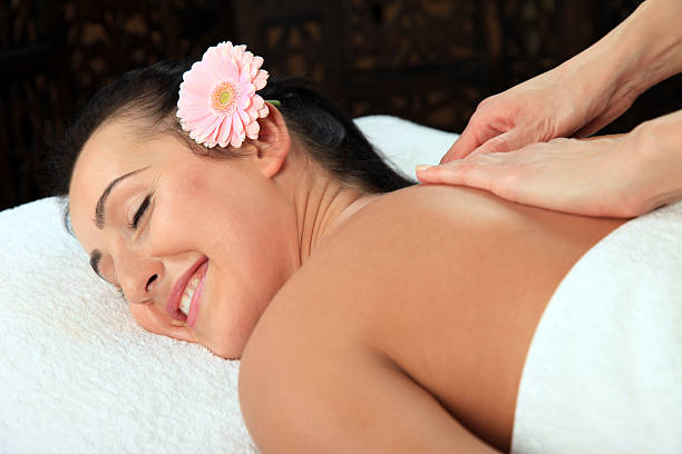 istock Young woman receiving massage - SPA 162444132