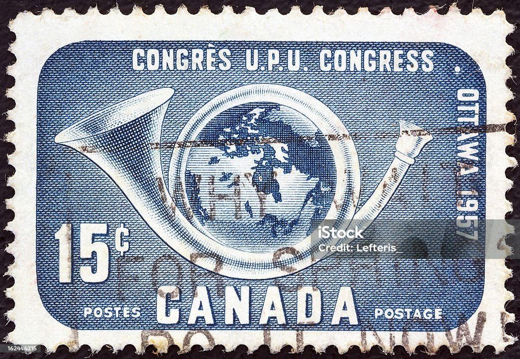 Canadian-Briefmarke zeigt Welt in posthorn (1983) - Lizenzfrei 1957 Stock-Foto