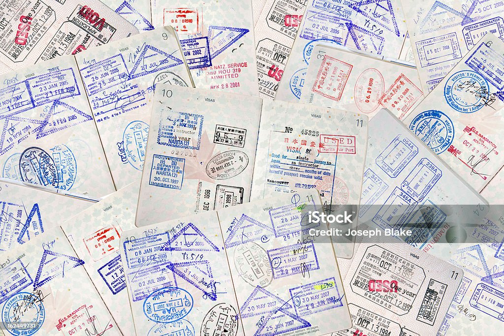 Pasaporte de viaje de sellos - Foto de stock de Sello de pasaporte libre de derechos
