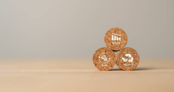 Reduce, Reuse and Recycle concept. Limit global warming and climate change. Nurturing environmental awareness. Round wooden cube blocks with Reduce, Reuse and Recycle icons. Environment protection.