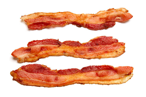 Prepared Bacon Prepared bacon isolated on white background. Rasher of Bacon stock pictures, royalty-free photos & images