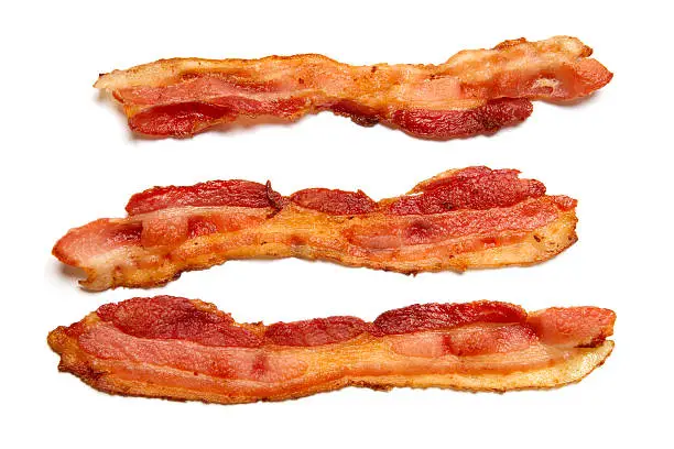 Prepared bacon isolated on white background.