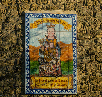 During Santiago way you may find a lot of ancient churches. At Navarra, in the small town of Bargota you can find this small church with this unusual image of the virgin Mary in a colorful mosaic