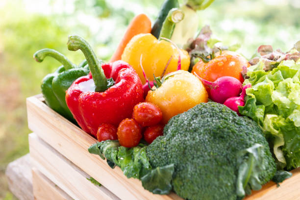istock Wooden crate filled with fresh organic vegetables 1624584437