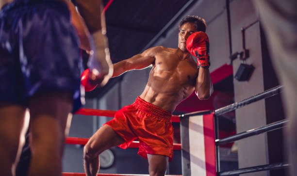 istock Boxer's determination shines in rounds, contesting with devotion to showcase Thai martial art skills 1624610572