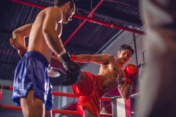 istock Boxer's determination shines in rounds, contesting with devotion to showcase Thai martial art skills 1624610573