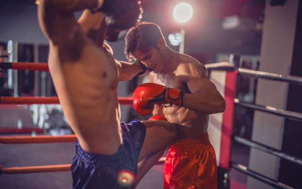 istock Boxer's determination shines in rounds, contesting with devotion to showcase Thai martial art skills 1624620611