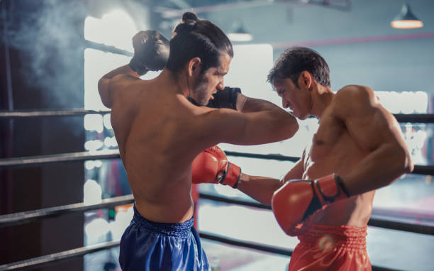 istock Boxer's determination shines in rounds, contesting with devotion to showcase Thai martial art skills 1624623460