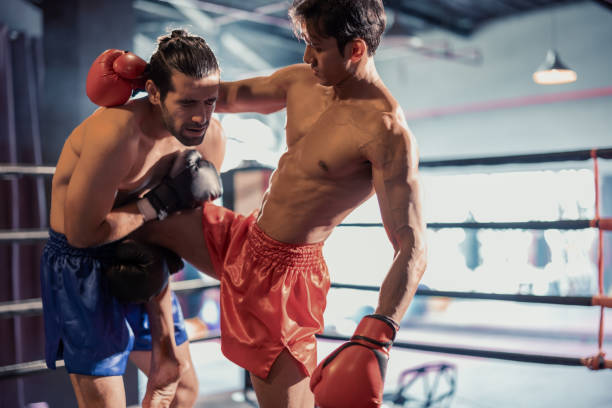 istock Boxer's determination shines in rounds, contesting with devotion to showcase Thai martial art skills 1624624268