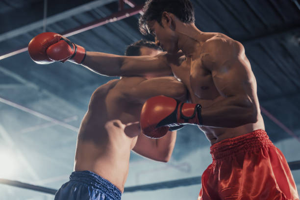 istock Boxer's determination shines in rounds, contesting with devotion to showcase Thai martial art skills 1624624292