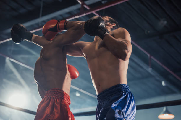 istock Boxer's determination shines in rounds, contesting with devotion to showcase Thai martial art skills 1624624293