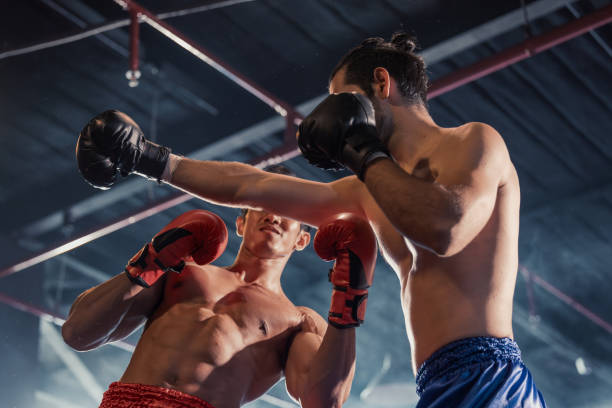 istock Boxer's determination shines in rounds, contesting with devotion to showcase Thai martial art skills 1624624296