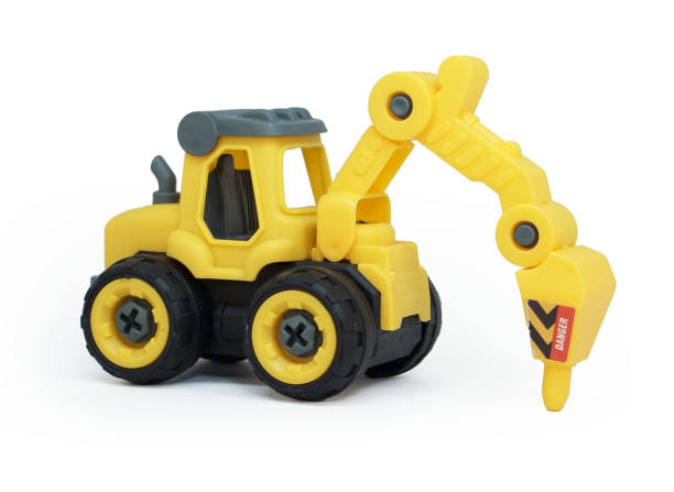 istock side view of yellow plastic tractor drill toy isolated on white background. heavy construction vehicle. 1624629557