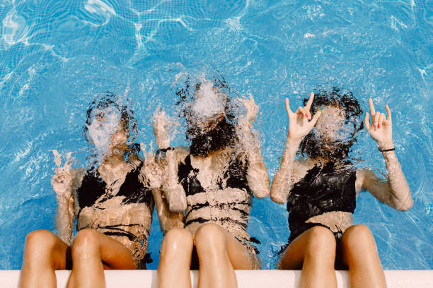 istock Taking a dip in the hotel pool. 1624656448