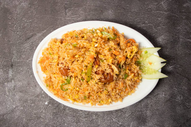 istock Special Fried Rice with chicken, prawn, egg and vegetable served in dish isolated on background top view of bangladesh food 1624661258