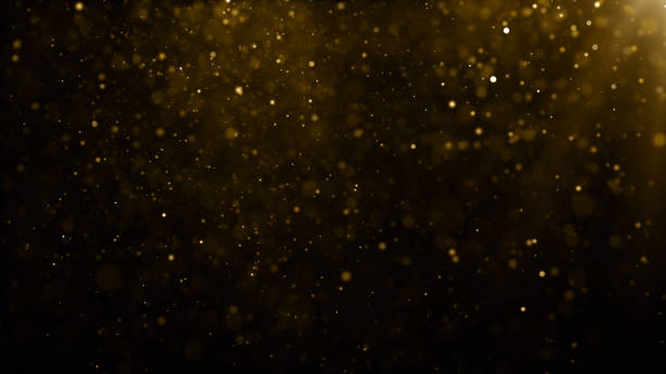 istock Particles gold glitter bokeh award dust abstract background 1624773584