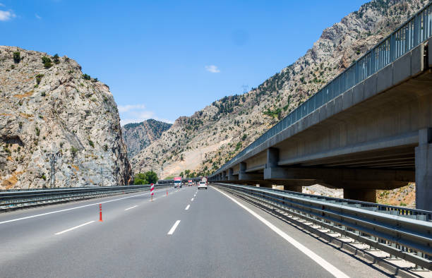 istock Highway Road Tunnel with luminous safety lights 1624843822