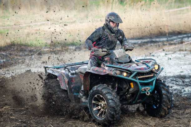 istock ATV, UTV, buggy, 4x4 off-road vehicle in mud and dust. Extreme, adrenalin 1624860296