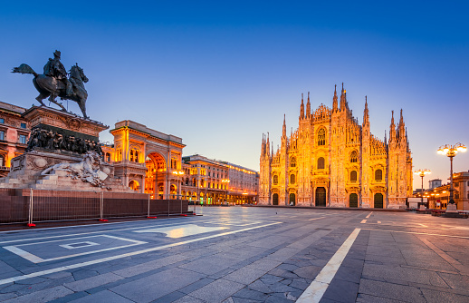 Milan, Italy - Cathedral Duomo di Milano and Vittorio Emanuele gallery in Square Piazza Duomo, morning twilight illuminated.
