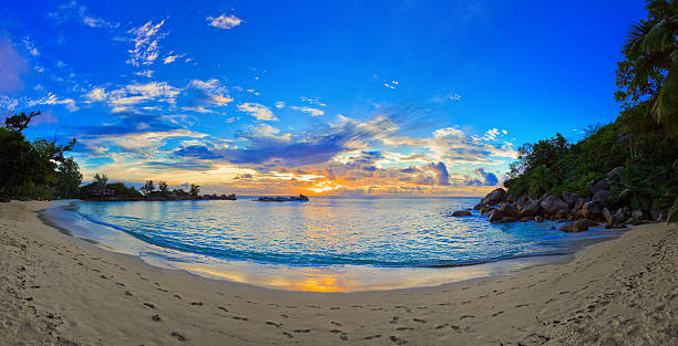 istock Panorama of tropical beach at sunset 162488722