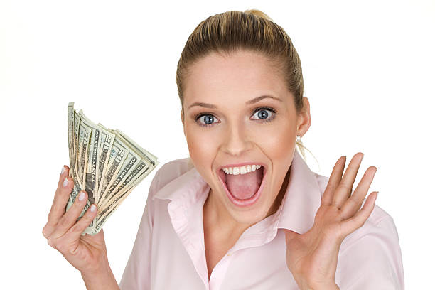 istock woman with cash 162489063