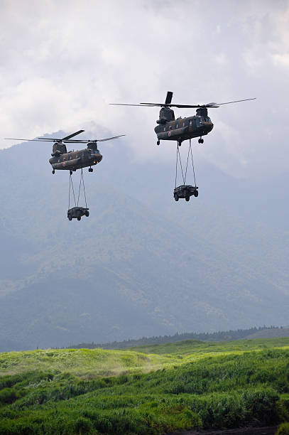 istock Helicopters transporting Cars 162489160