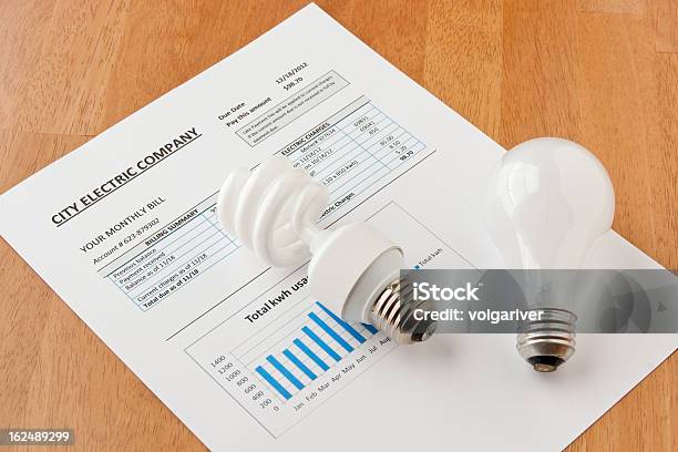Energy Efficient House Stock Photo - Download Image Now - Financial Bill, Lighting Equipment, Electricity