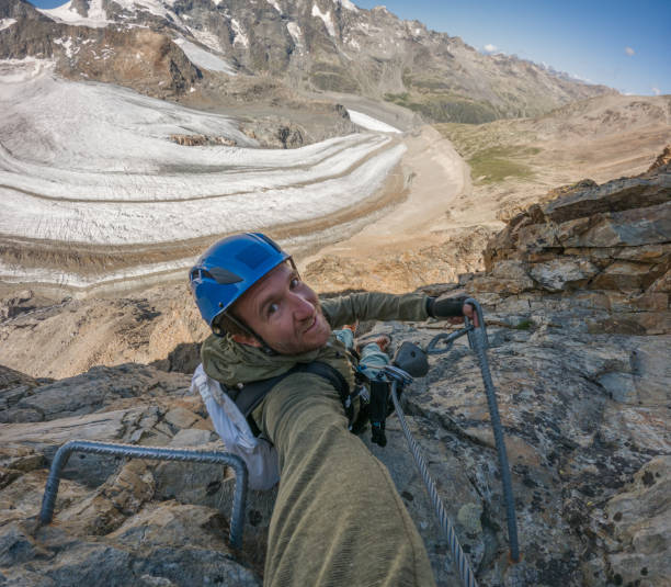 istock Man takes cool selfie on Via Ferrata route 1624904370