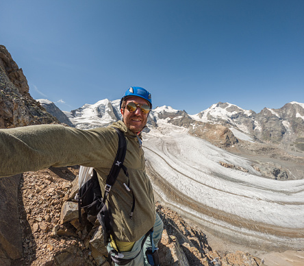 Selfie POV via ferrata rock climbing route in the Alps