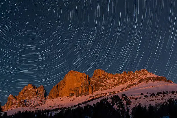 Rosengarten and startrails in a winter evening, Dolomites - Italy