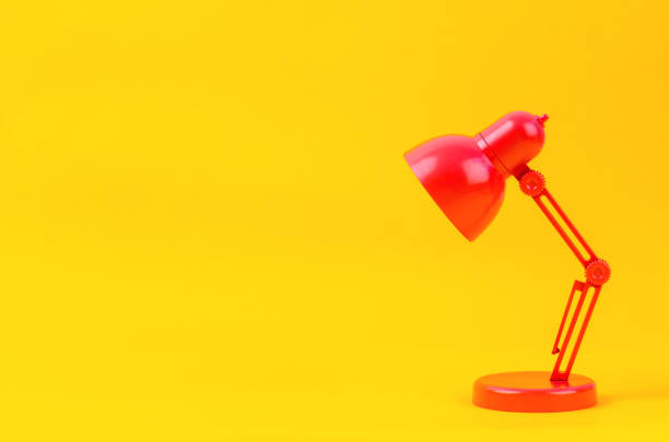 istock The Red folding table lamp on yellow background. 1624930317