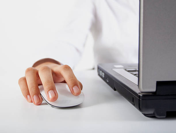 istock Closeup woman hand on mouse 162493120