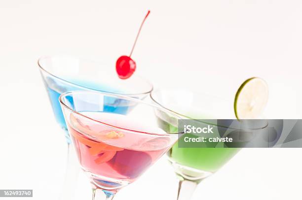 Martini Cocktails Close Up Stock Photo - Download Image Now - Alcohol - Drink, Blue, Cherry