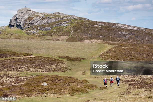 Haytor Rocks And Three Walkers On Dartmoor Devon Stock Photo - Download Image Now - Dartmoor, Walking, Devon