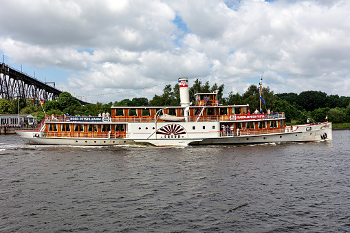 Osterönfeld, Germany - June 13, 2021: side-paddle steamer FREYA in the Kiel Canal