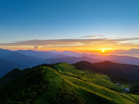 View of a sunset from the top of a mountain in Japan