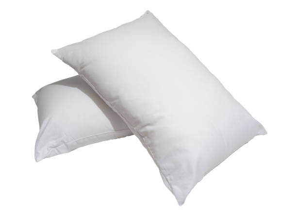 istock White pillows in stack in hotel or resort room isolated on white background with clipping path. Concept of comfortable and happy sleep in daily life 1625006017