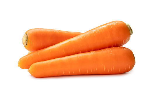 Carrot slices arrangement in a row composition full frame vegetables background