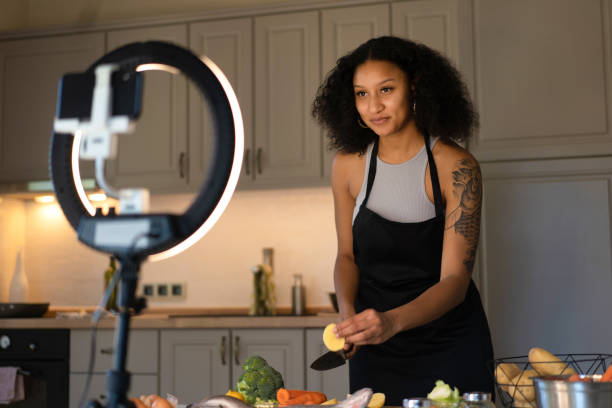 istock African-American woman vlogging in her kitchen 1625034159