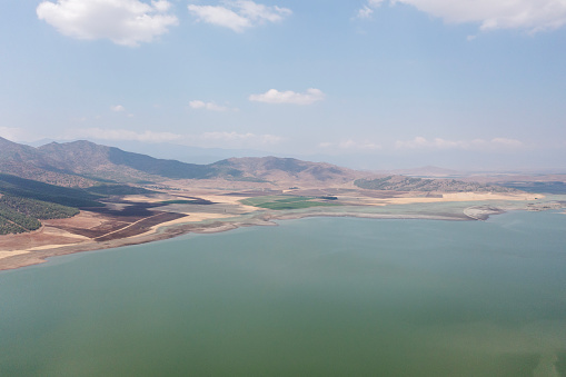 Aerial photo of panoramic view of Tahtali dam lake on a sunny day, Kilis, Turkiye.